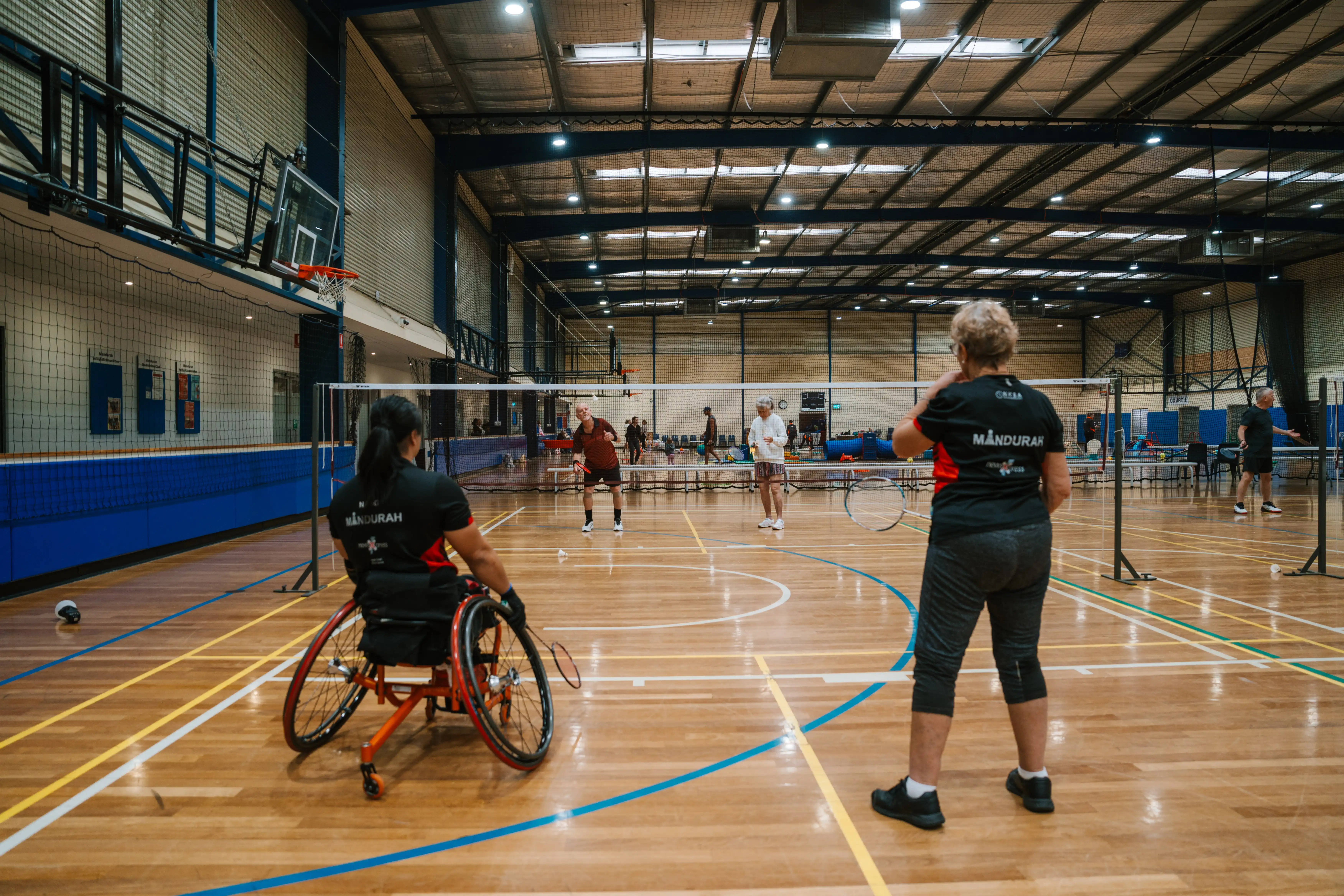 people playing game of badminton. 
